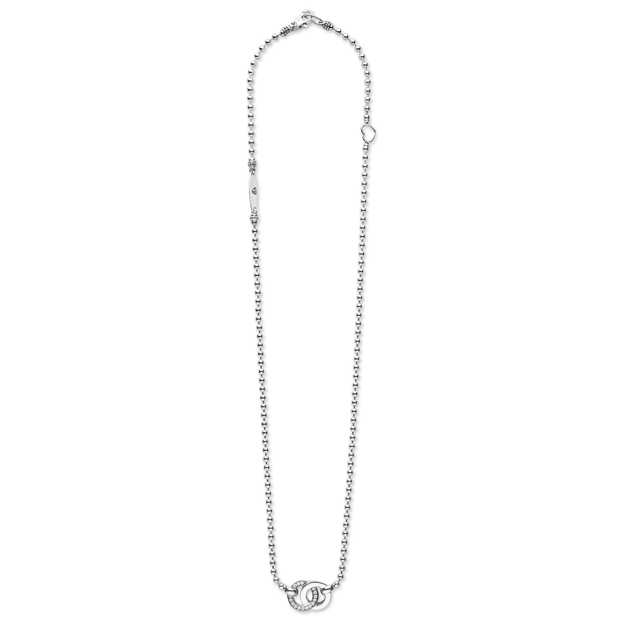 Signature Caviar Silver Interlocking Diamond Pendant Necklace, featuring polished and pavé-set circles on a sterling silver ball-chain with a lobster clasp, embodies elegance and connection.