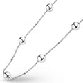 Caviar Bubbly Silver Beaded Station Necklace in sterling silver, featuring polished beads and textured spacers on a fine chain, showcasing LAGOS craftsmanship in elegant design.
