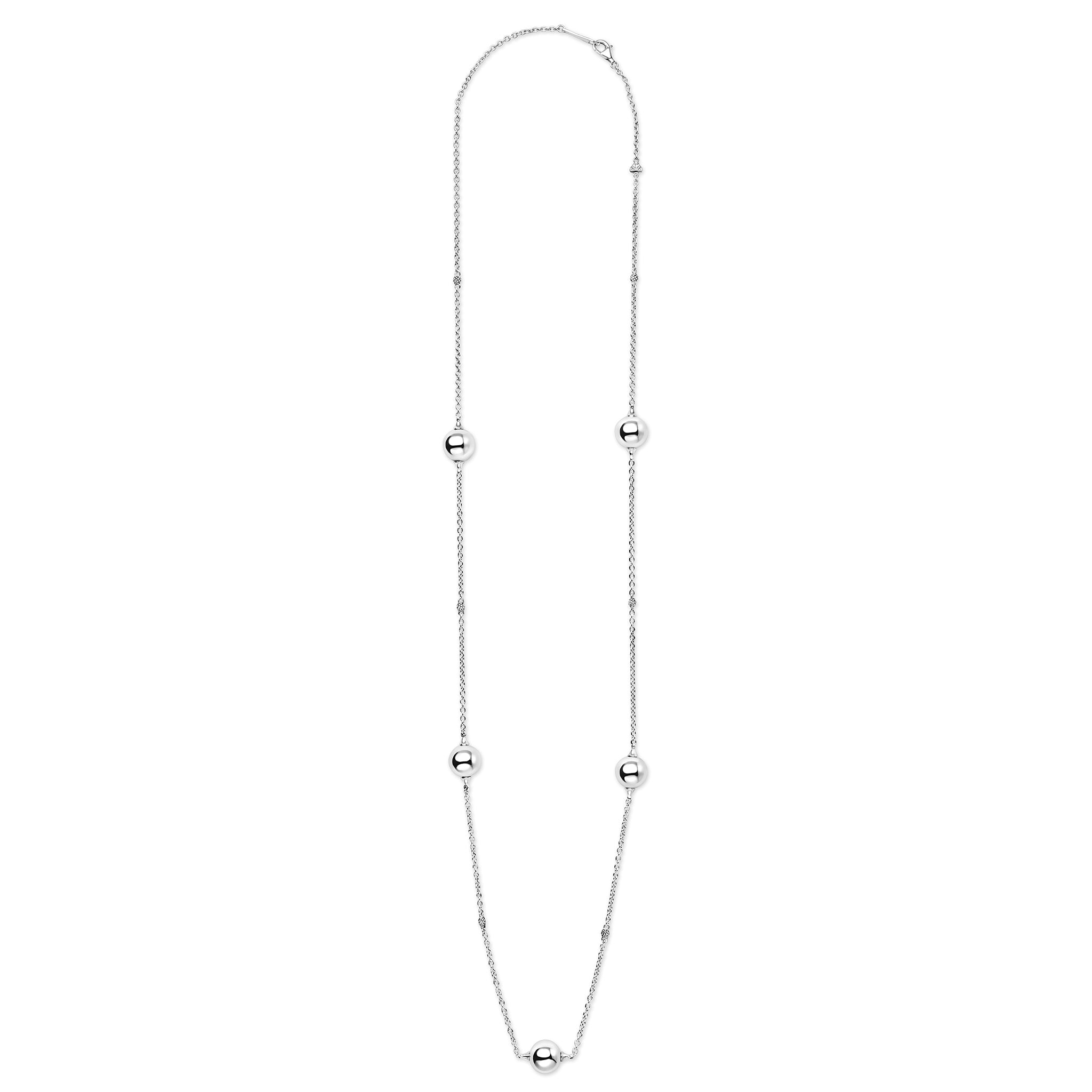 Silver necklace with small beads on a white background