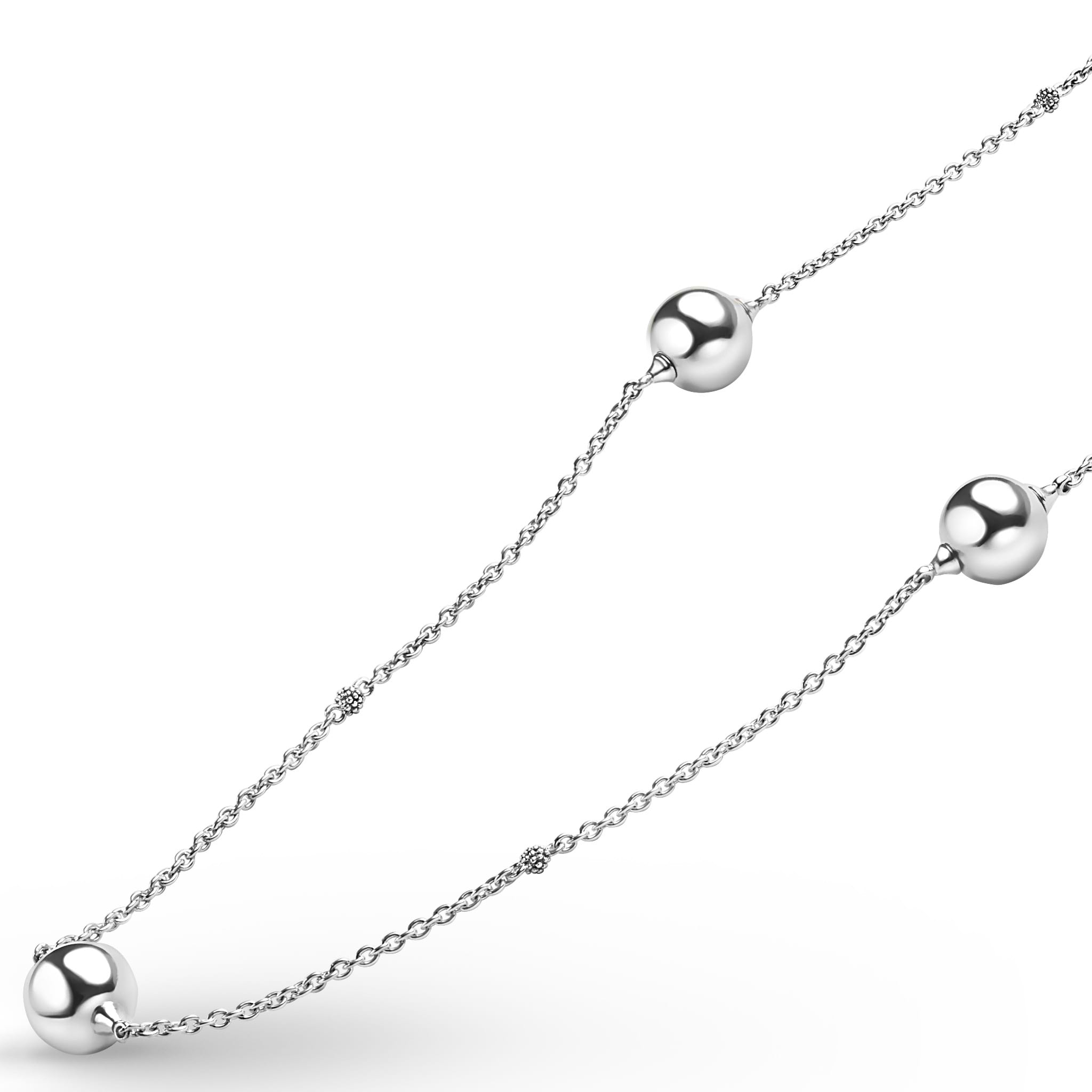 Closeup of sterling silver chains with silver beads