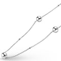 Closeup of sterling silver chains with silver beads