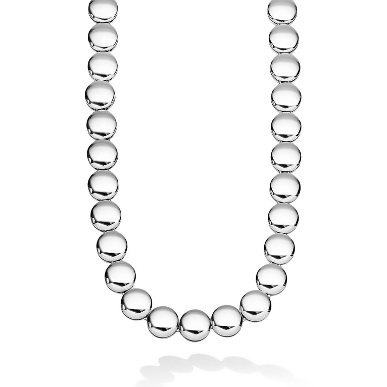 Caviar Bubbly Sterling Silver Disc Necklace featuring polished disc beads in a U-shape, reflecting light elegantly, showcasing LAGOS's commitment to quality and timeless design.