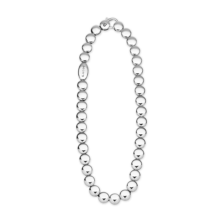 Caviar Bubbly Sterling Silver Disc Necklace featuring polished sterling silver spheres, lobster-claw clasp, and LAGOS tag, offering minimalist elegance and sculptural design.