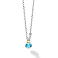 Signature Caviar Two-Tone Swiss Blue Topaz Oval Pendant Necklace features a vibrant blue topaz in sterling silver, accented with 14K gold, showcasing LAGOS elegance and craftsmanship.