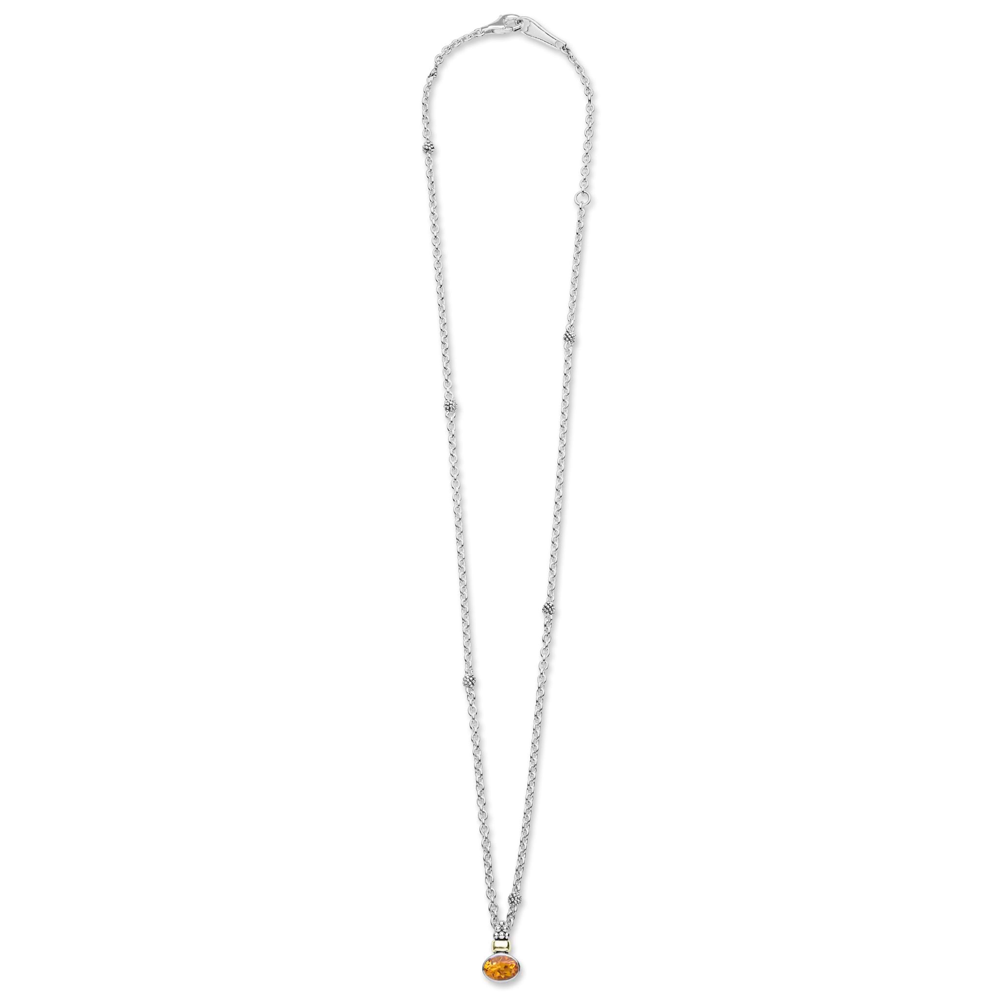 Signature Caviar Two-Tone Citrine Oval Pendant Necklace features a citrine gemstone on a sterling silver chain with 18K gold accents and caviar beading.