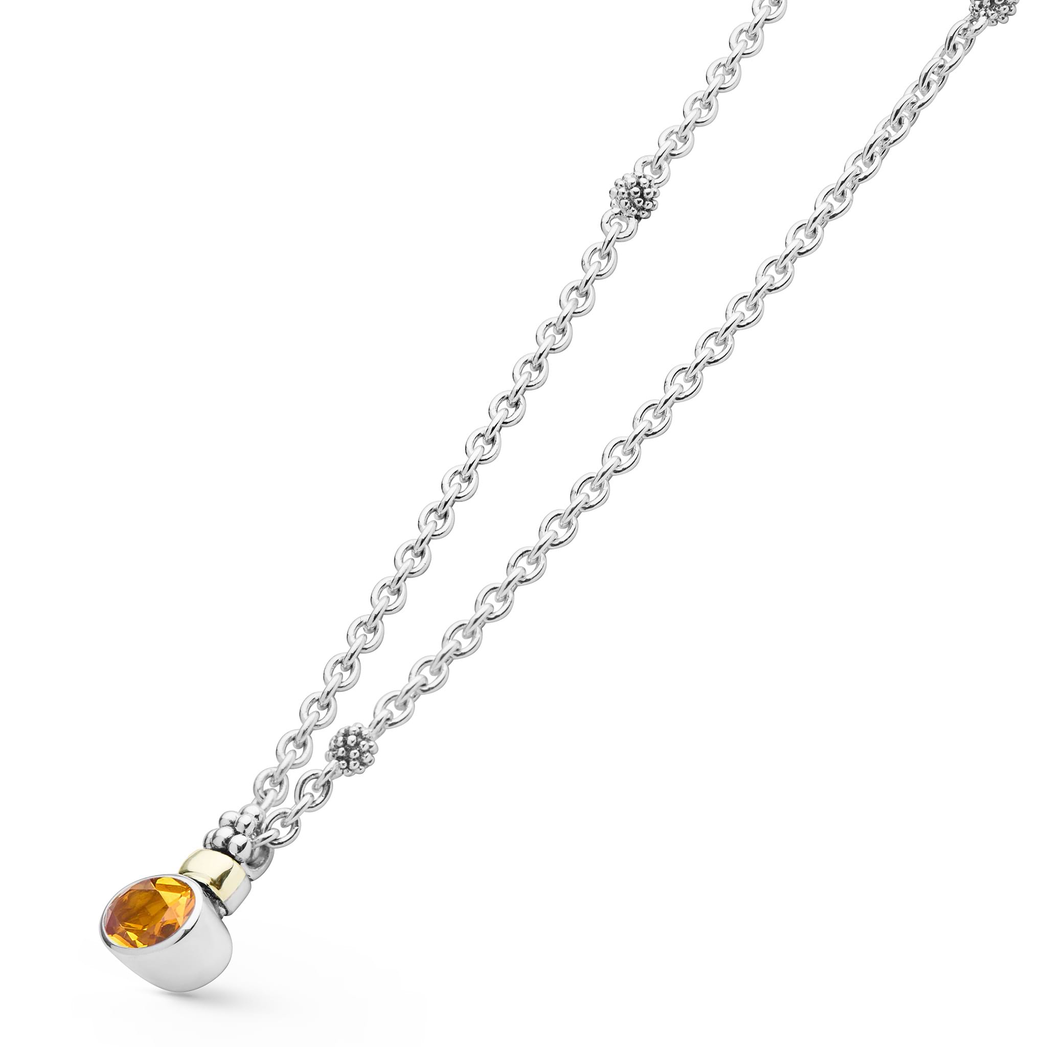 Signature Caviar Two-Tone Citrine Oval Pendant Necklace featuring a faceted citrine gemstone in a sterling silver bezel with 18K gold accents on an adjustable chain.