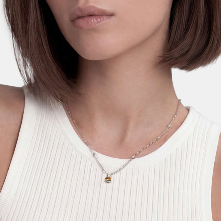 Woman wearing a Two-Tone Citrine Oval Pendant Necklace