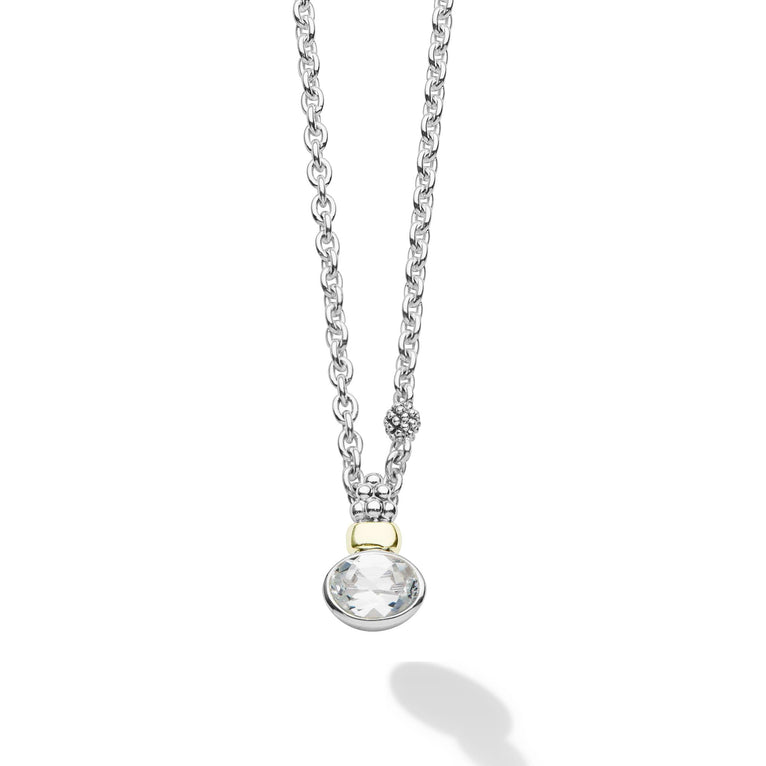 Signature Caviar Two-Tone White Topaz Oval Pendant Necklace featuring a white topaz gemstone in a silver bezel, accented by 14K gold and caviar beading on a chain.