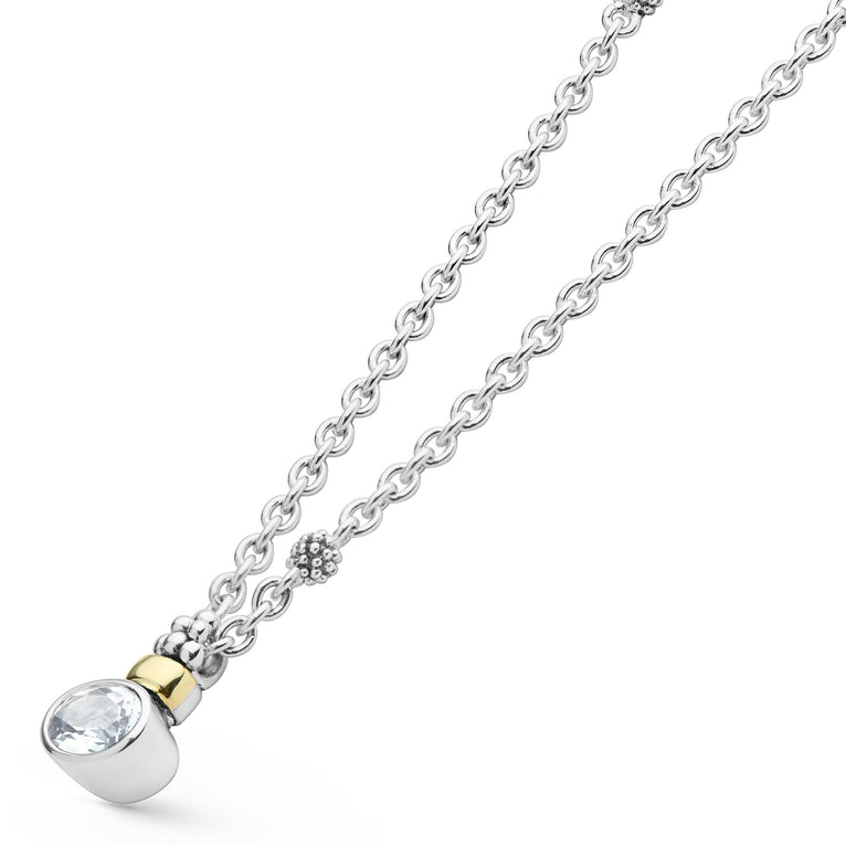Signature Caviar Two-Tone White Topaz Oval Pendant Necklace with a faceted gemstone, silver chain, silver bead accents, and gold collar detail.