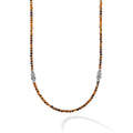 Signature Caviar Tiger Eye & Sterling Silver Station Necklace features polished brownish-gold tiger eye beads and sterling silver stations, offering a sophisticated, versatile design.