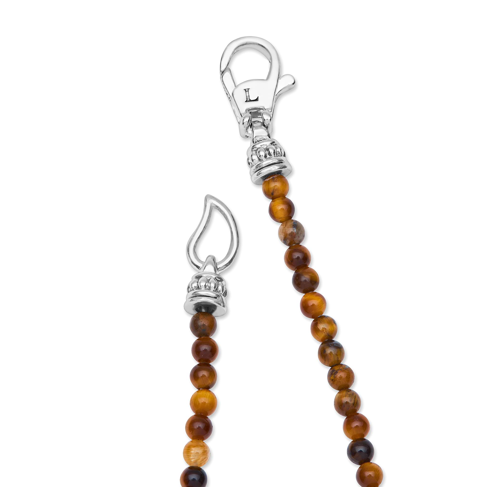 Signature Caviar Tiger Eye & Sterling Silver Station Necklace showcasing tiger eye beads and sterling silver charms, featuring a lobster clasp and elegant caviar beading design.