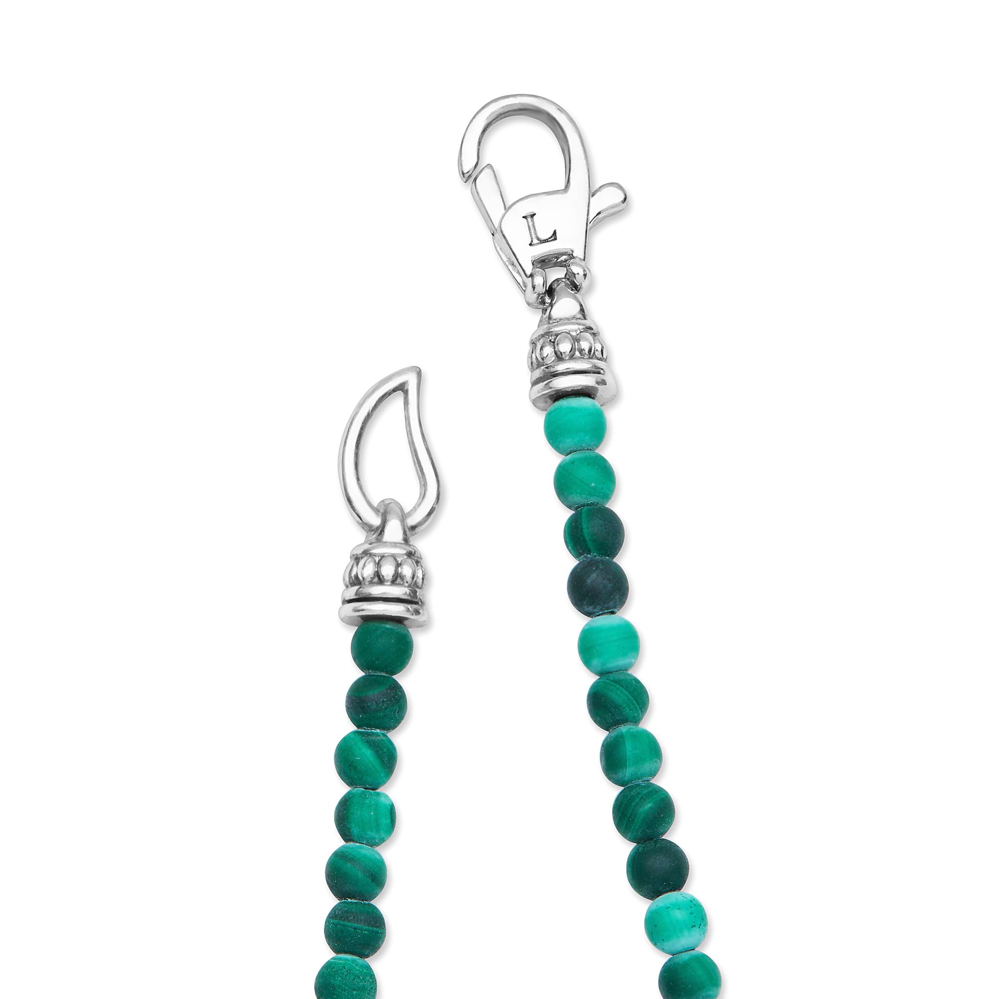 Signature Caviar Malachite & Sterling Silver Station Necklace features turquoise beads and sterling silver stations, showcasing LAGOS artisanship and refined elegance.