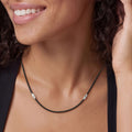 Woman wearing the Black Agate & Sterling Silver Station Necklace