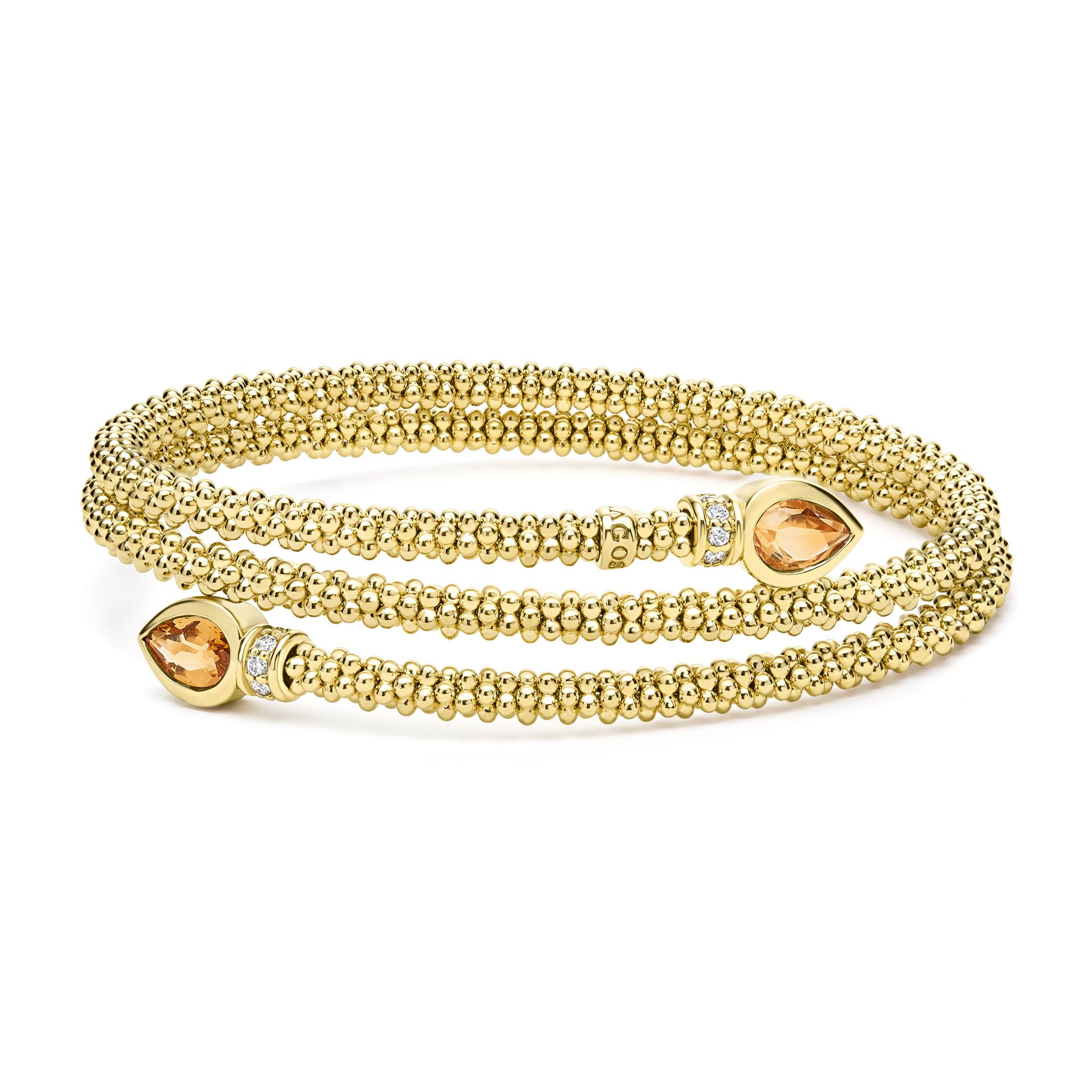 Two pear-shaped citrine gemstones are accented by diamonds and set in 18k gold Caviar beading to form this luxe wrap bracelet. LAGOS diamonds are the highest quality natural stones.