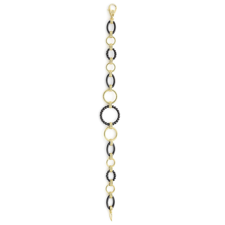 Meridian 18K Gold and Black Ceramic Link Bracelet featuring alternating black bead-rings and gold-tone links with a lobster-claw clasp and gold loops for versatile attachment.