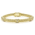 Three pavé diamond X stations accent this 18k gold Caviar beaded bracelet. LAGOS diamonds are the highest quality natural stones.