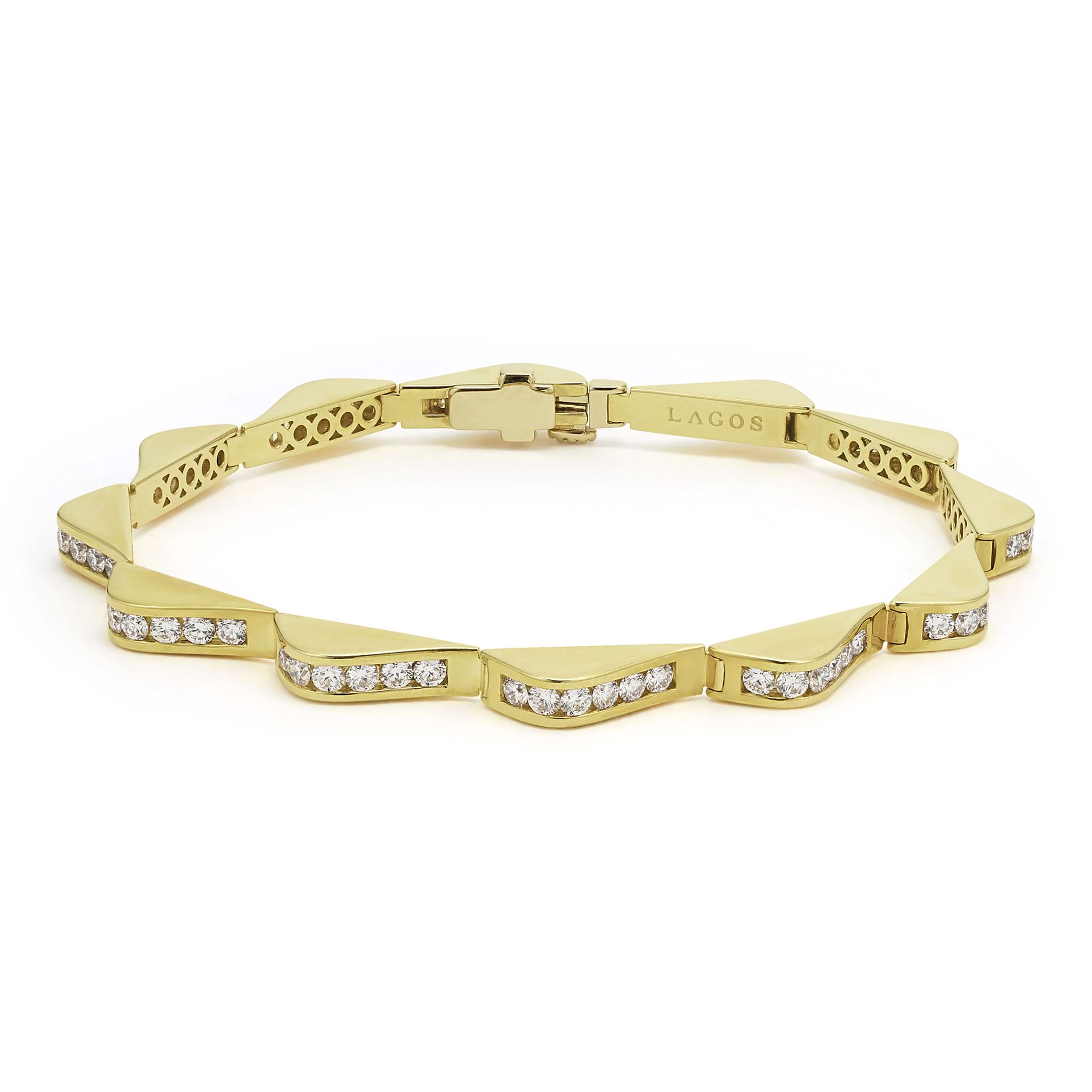 18K gold and diamonds form this luxe link wave bracelet. LAGOS diamonds are the highest quality natural stones.