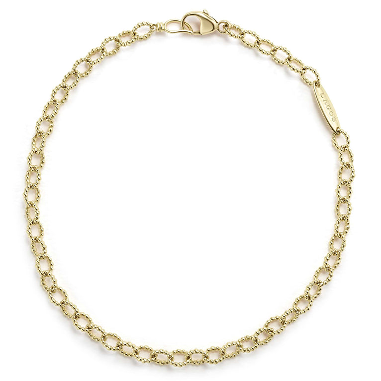 18K gold fluted links form this every day bracelet. Finished on a signature lobster clasp.