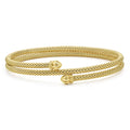 18K gold Caviar beading forms this double wrap coil bracelet.