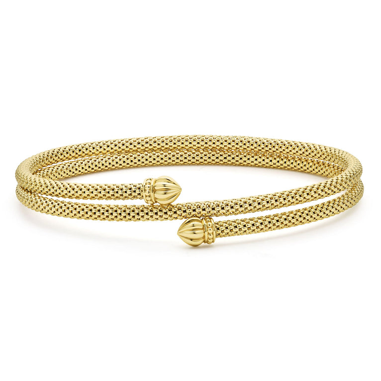 18K gold Caviar beading forms this double wrap coil bracelet.