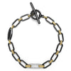 18K gold variations of Caviar beading and black ceramic accented by a single diamond station forms this bold link bracelet. LAGOS diamonds are the highest quality natural stones.