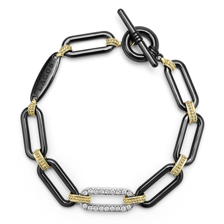 18K gold and black ceramic with a single diamond station forms this bold link bracelet. LAGOS diamonds are the highest quality natural stones.