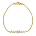 18K gold beaded bracelet with a bezel-set diamond centerpiece and lobster clasp