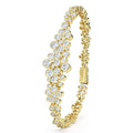 upright view of cluster diamond tennis bracelet set in 18K gold with LAGOS engraving on white background