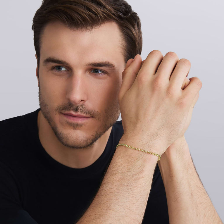 man wearing 18K gold double cable chain link bracelet, 3.5 mm, signature lobster clasp close-up