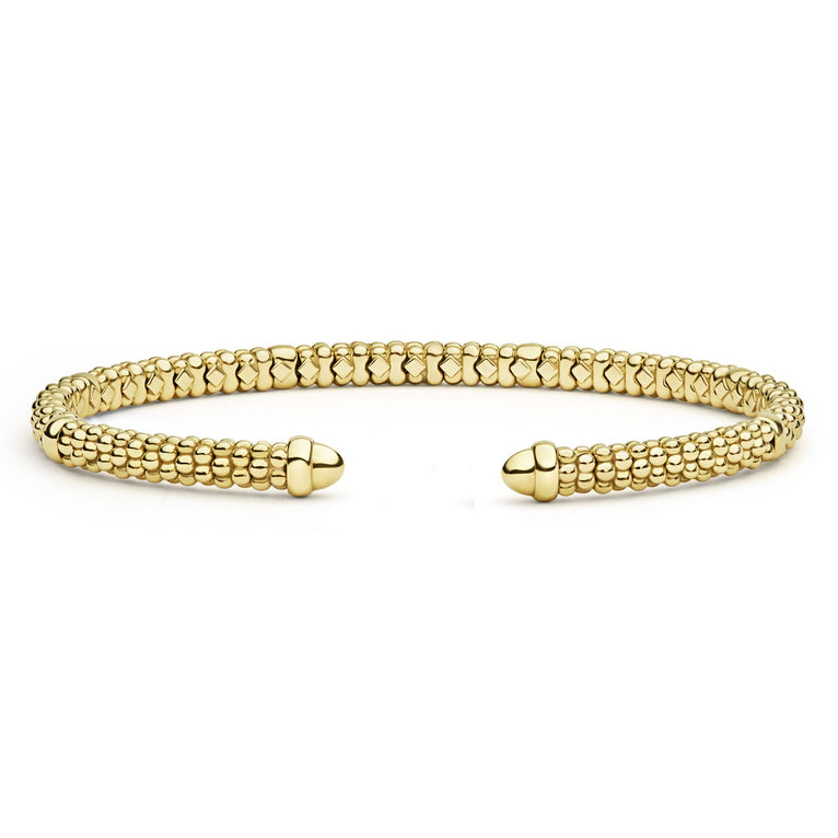 Signature Caviar 18K Gold Mini Versa Torque Bracelet, featuring polished beaded elements and an open cuff design, embodies modern elegance and refined style.