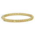 Signature Caviar 18K Gold Mini Versa Torque Bracelet, featuring polished gold beads in a sleek, flexible 3mm open torque design, showcasing modern elegance.