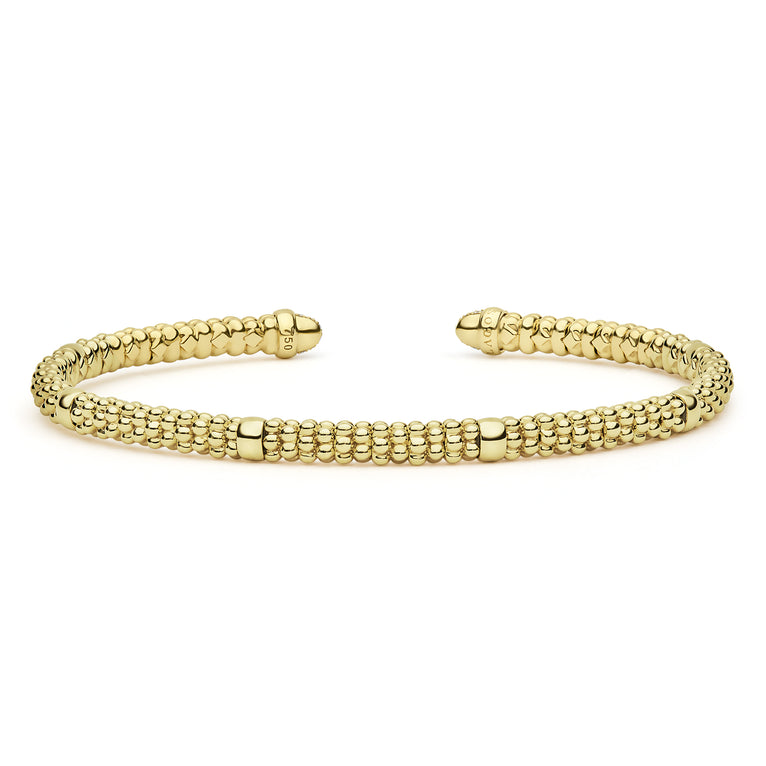 Signature Caviar 18K Gold Diamond Mini Versa Torque Bracelet with caviar beading, featuring an open cuff design and diamond accents.
