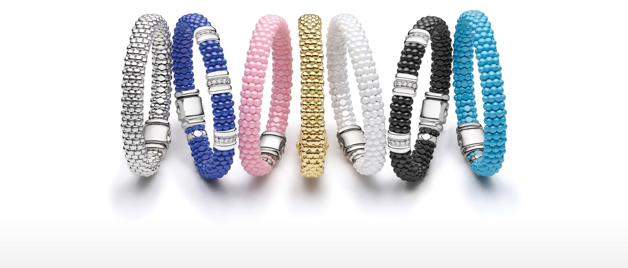 Three beaded bracelets in blue, pink, and black with silver accents on a white background