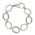 Signature Caviar Two-Tone Oval Link Bracelet with polished, textured silver links and gold Caviar accents, showcasing LAGOS elegant craftsmanship.