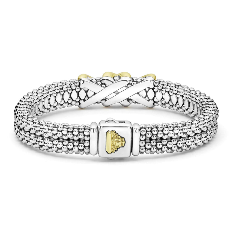 back of thick sterling silver beaded bracelet with gold x details with LAGOS crest 