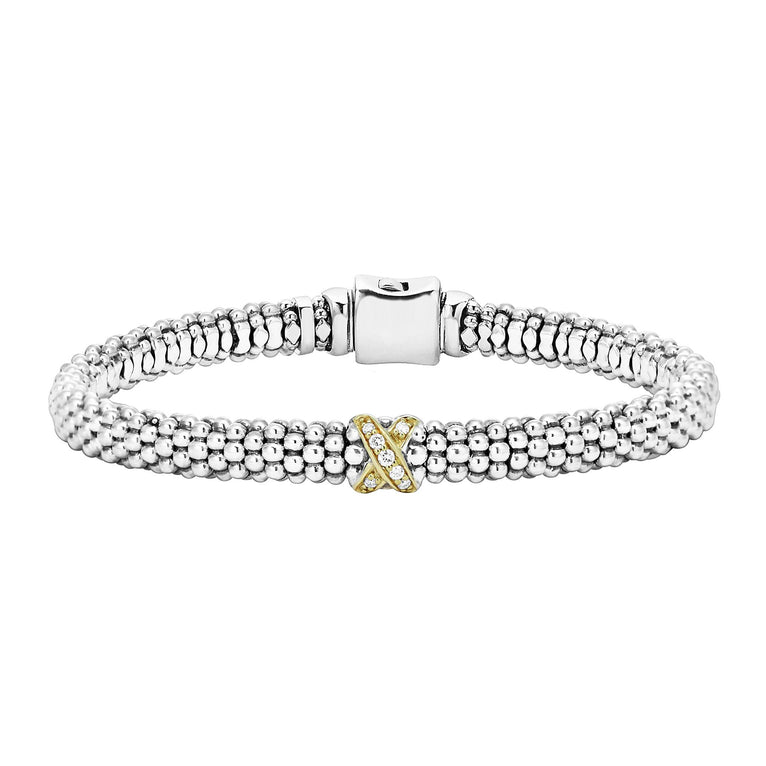 An 18K gold diamond X station wraps this sterling silver Caviar beaded bracelet. LAGOS diamonds are the highest quality natural stones.