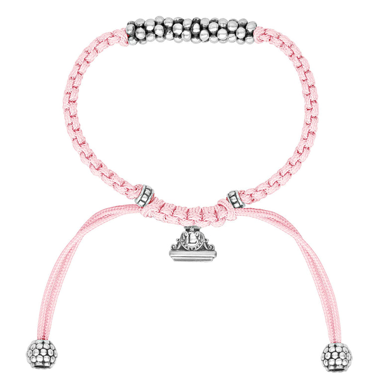 Created for children. Pink braided nylon with sterling silver Caviar beads form a versatile bracelet from the LAGOS Kinder collection.