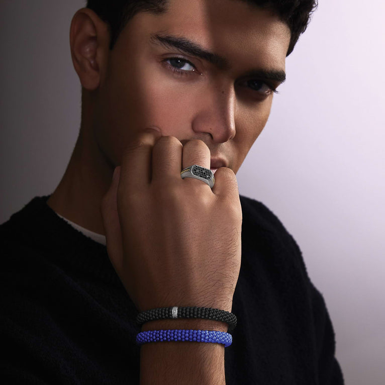 Man wearing LAGOS jewelry