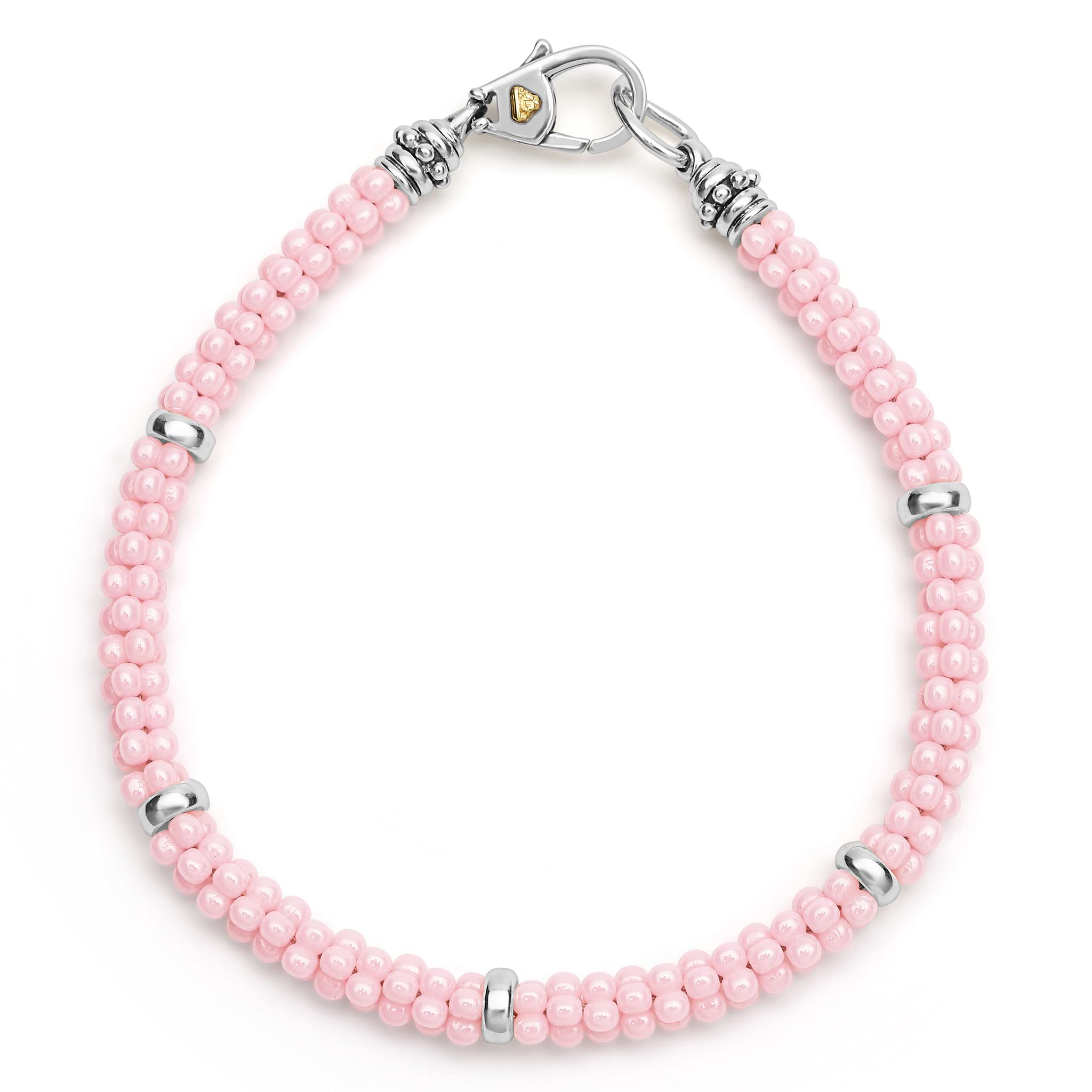 A pink ceramic Caviar bracelet accented by five sterling silver stations.