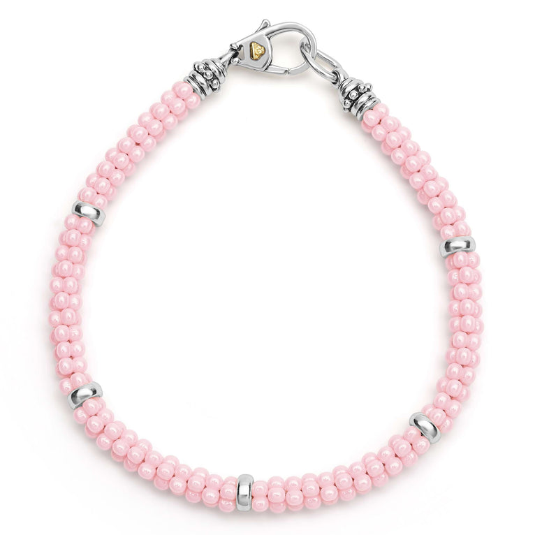 A pink ceramic Caviar bracelet accented by five sterling silver stations.