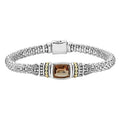 Smokey quartz bezel-set gemstone and sterling silver Caviar bracelet with 18K gold accents. Finished with a signature box clasp detailing the LAGOS crest.