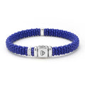 Blue Caviar Single Station Matte Blue Ceramic Diamond Bracelet with royal-blue beads, sterling silver clasp, and LAGOS emblem, showcasing elegance and modern sophistication.