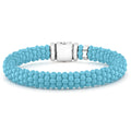 A blue ceramic Caviar bracelet that is finished with a sterling silver box clasp.