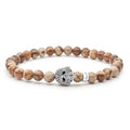 Picture jasper gemstone beaded bracelet with a sterling silver Caviar skull.