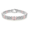 A single diamond station set in sterling silver surrounded by pink ceramic and Caviar beading. LAGOS diamonds are the highest quality natural stones.