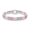 Caviar beading in sterling silver and smooth pink ceramic form this signature bracelet.