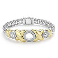 Three diamond circles set in 18K gold X-motifs accent this sterling silver Caviar beaded bracelet. LAGOS diamonds are the highest quality natural stones.
