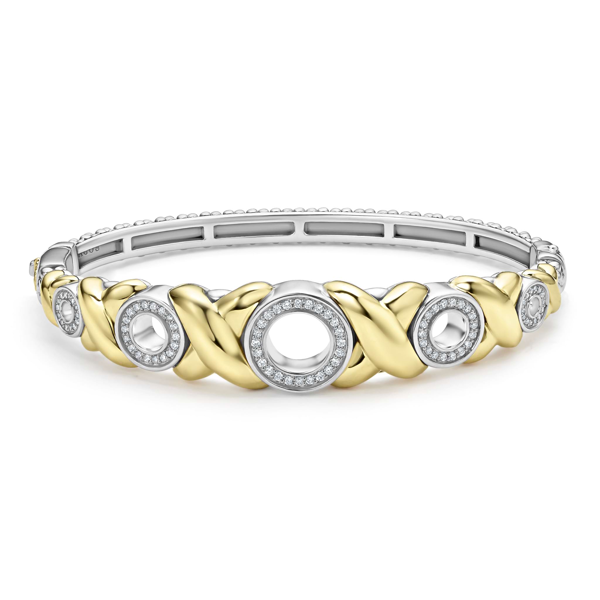 Five diamond circles set in 18K gold X-motifs accent this sterling silver Caviar beaded bracelet. LAGOS diamonds are the highest quality natural stones.