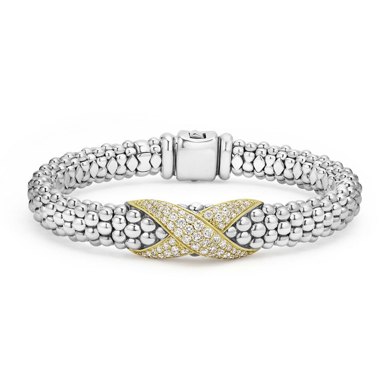 Smooth 18K gold, diamonds, and sterling silver Caviar beading form this X station bracelet. LAGOS diamonds are the highest quality natural stones.