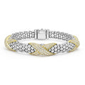 Sterling silver Caviar beading accented by three 18K gold and diamond X stations form this detailed bracelet. LAGOS diamonds are the highest quality natural stones.